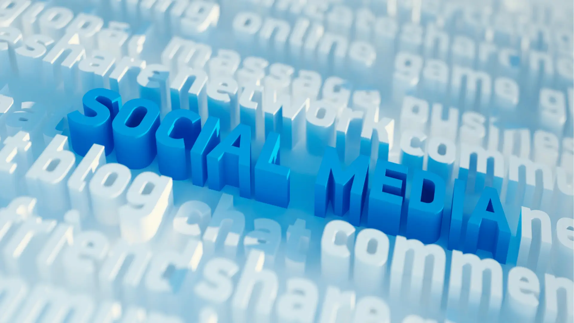 Blue three-dimensional raised text reading social media surrounded by blurred white words for planning