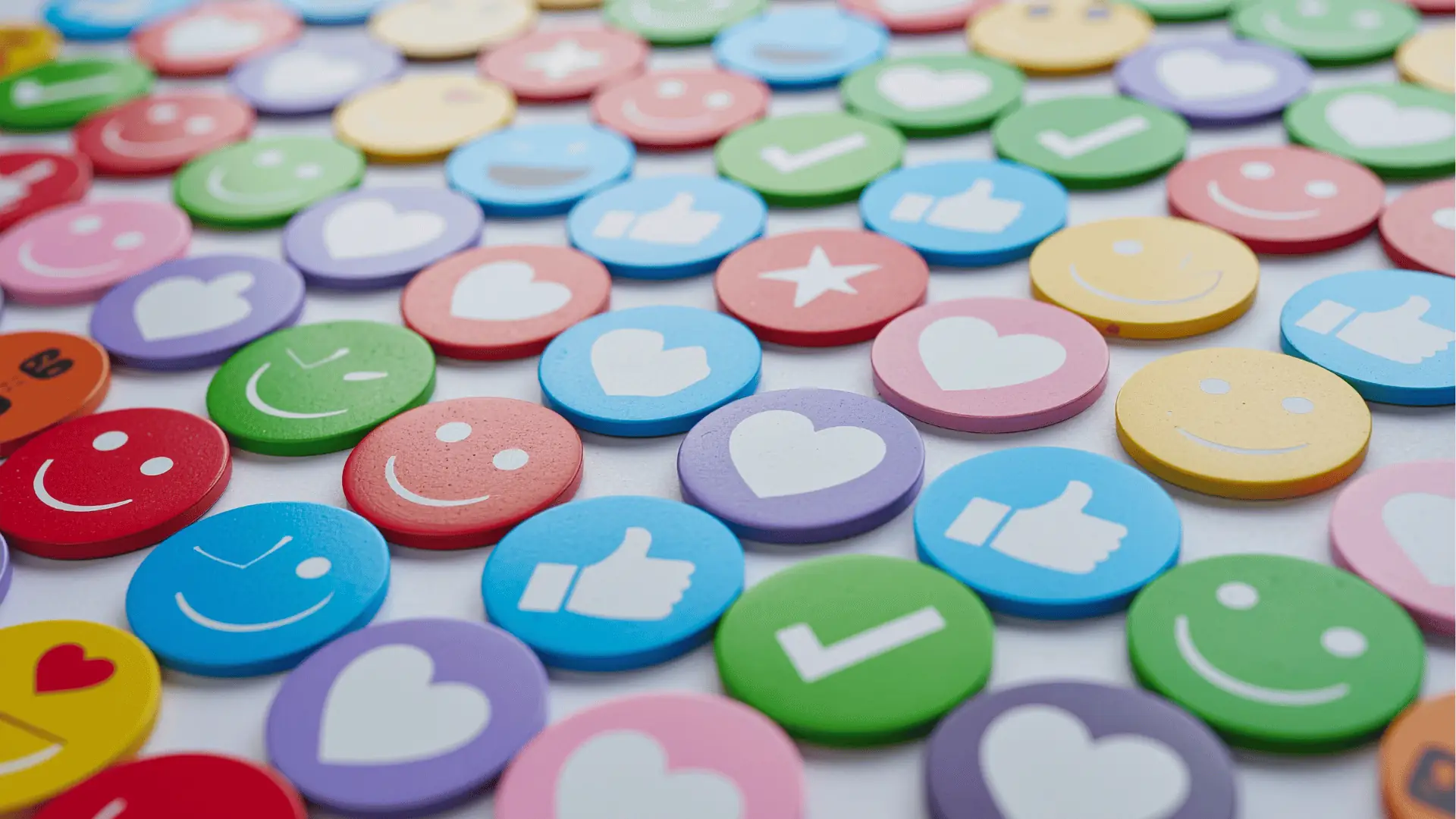 Colorful social media reaction icons representing likes, comments and shares