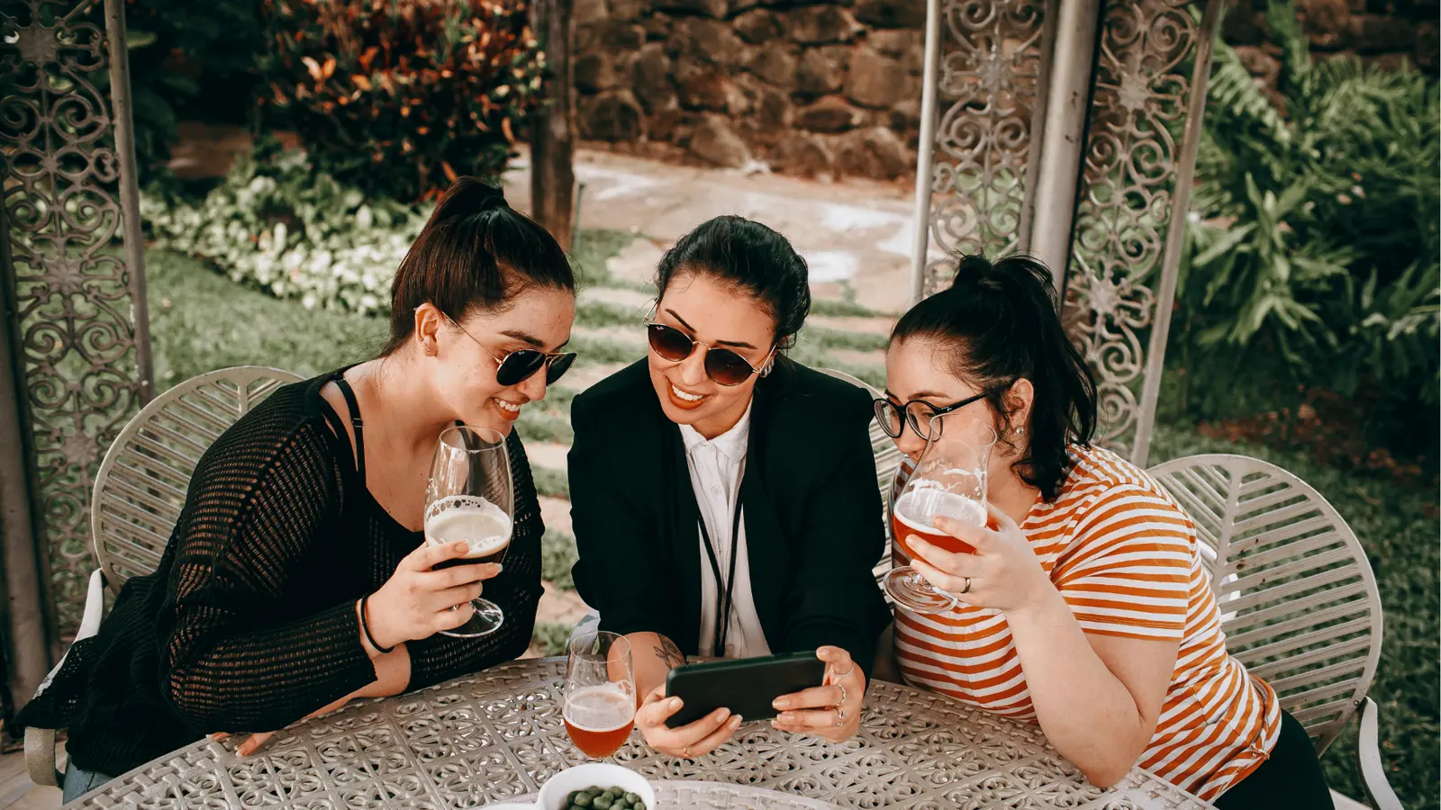 Colleagues laughing together outdoors