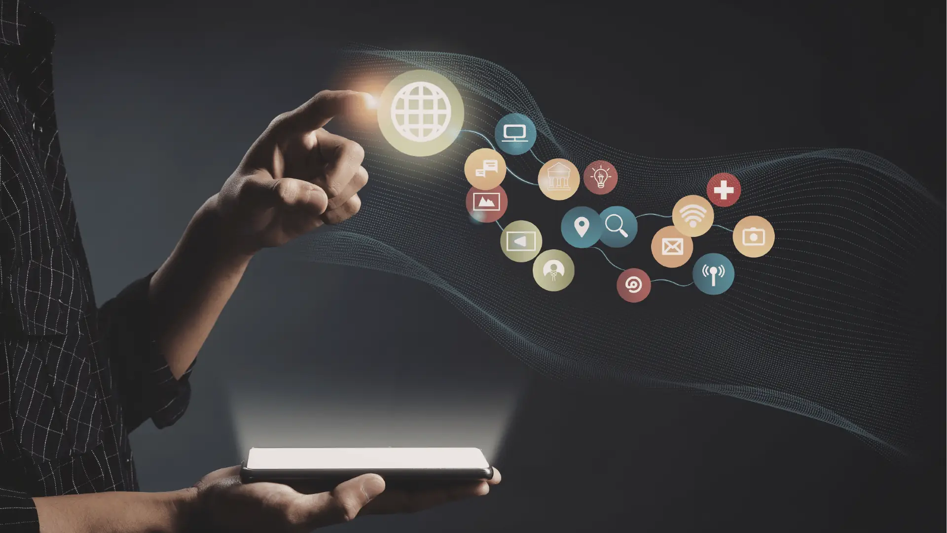 Hand holding smartphone and touching glowing globe with connected app icons