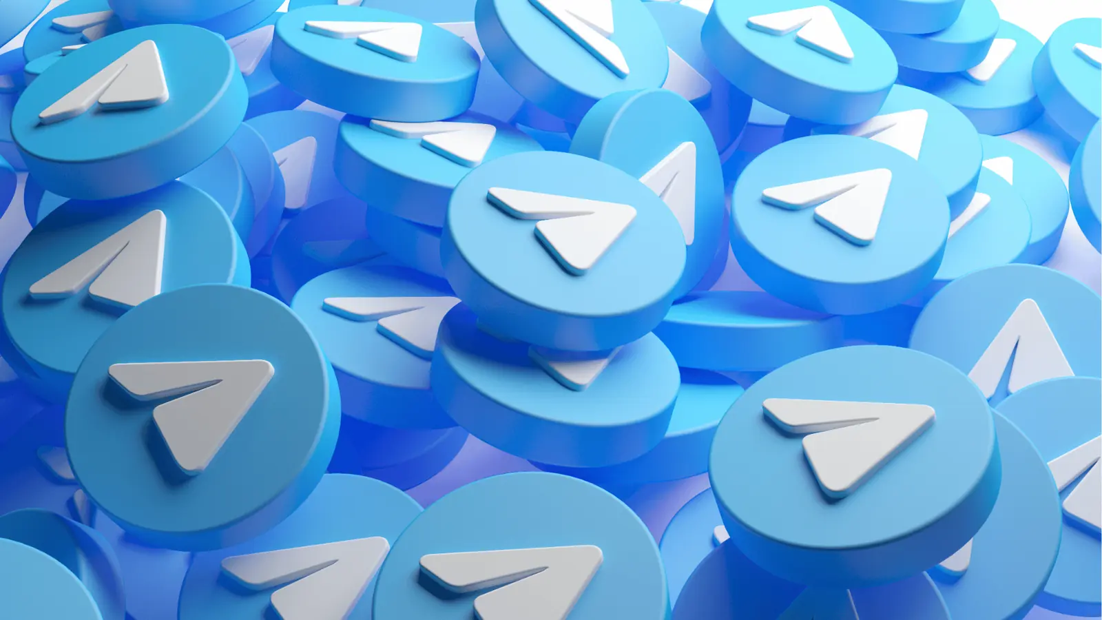 Stack of blue round tokens showing white paper-plane Telegram logo