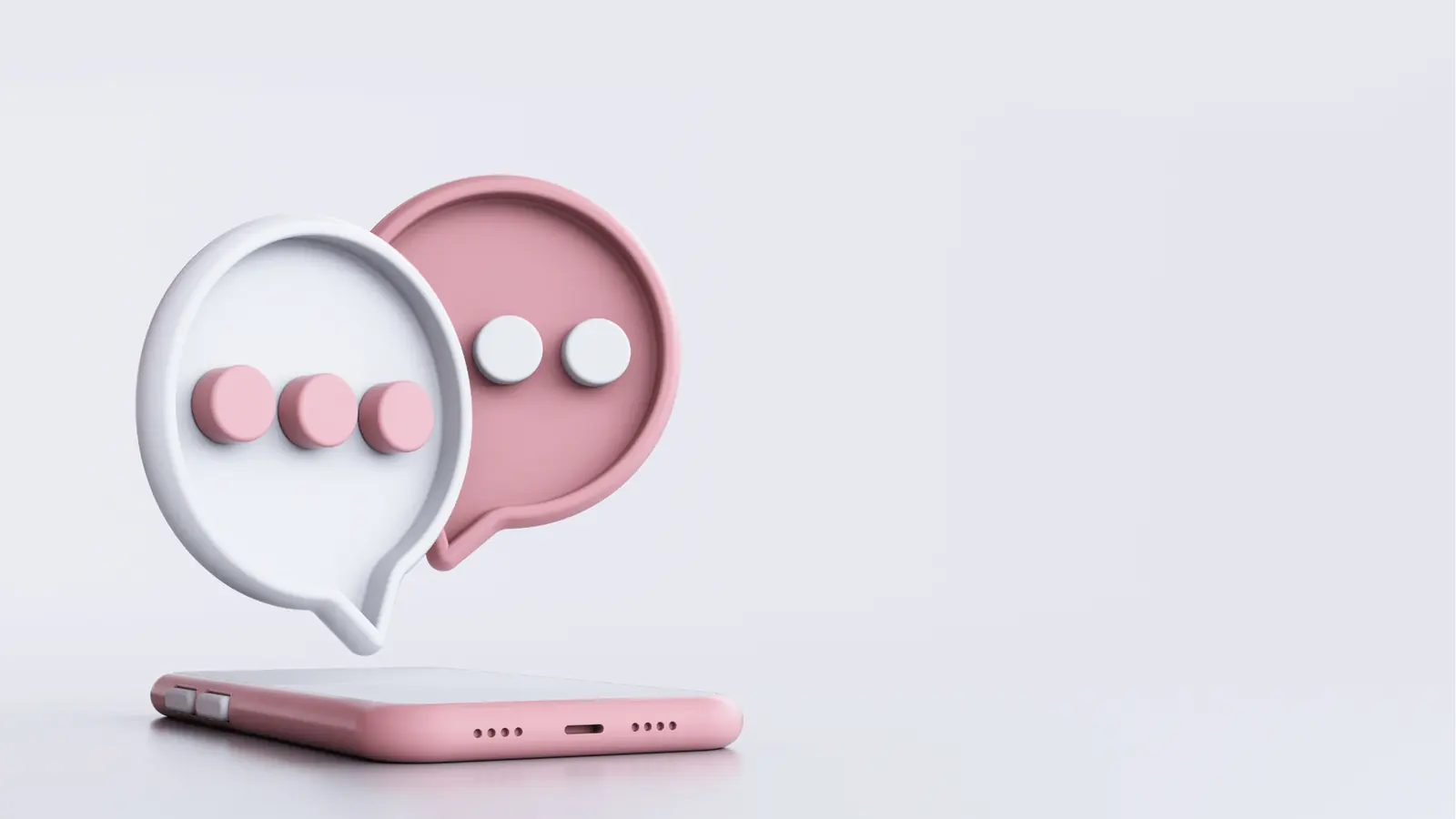 Pink and white 3D chat bubbles floating above a pink smartphone for automation