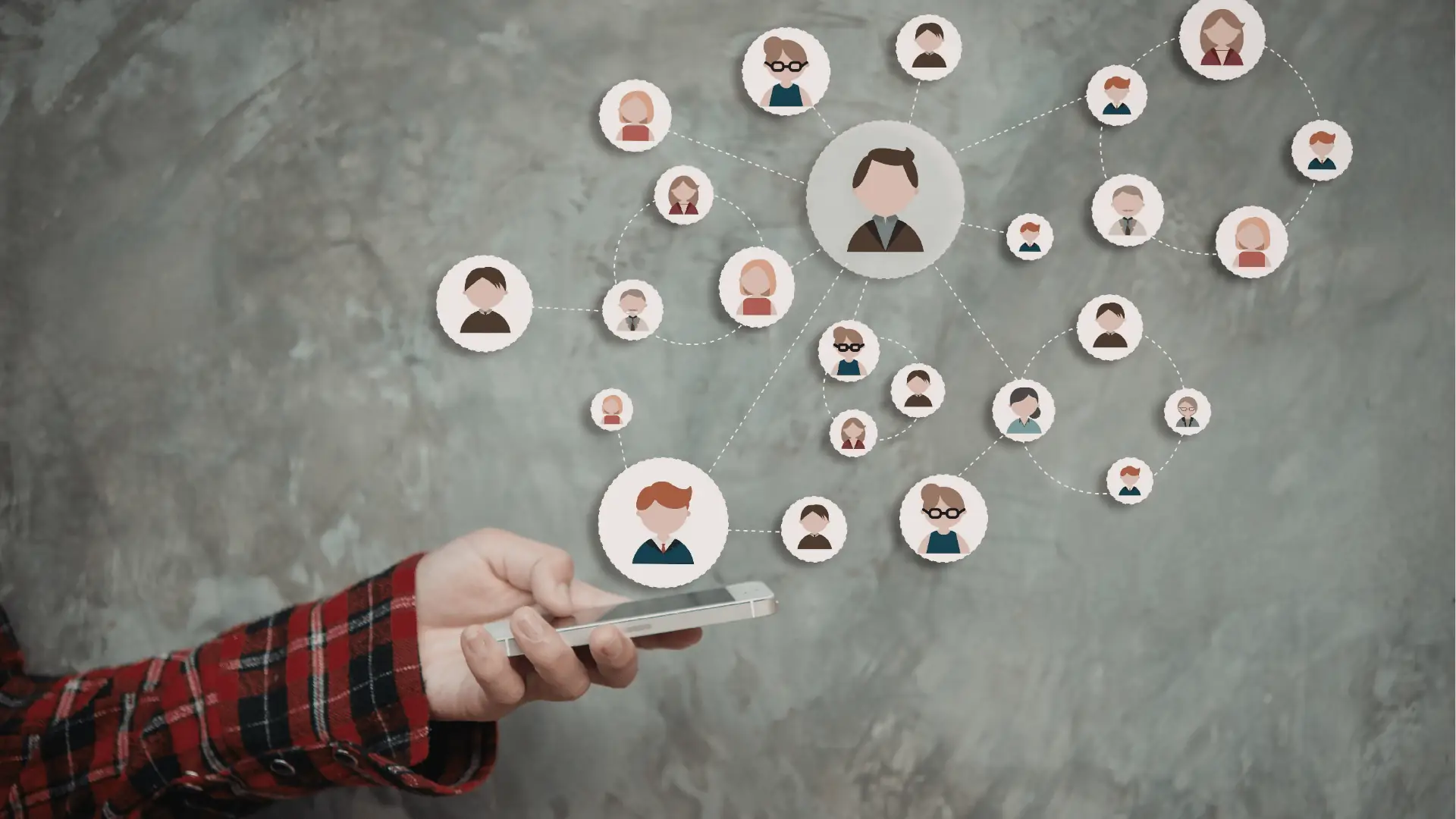 Hand holding smartphone with illustrated avatar network connected by dotted lines