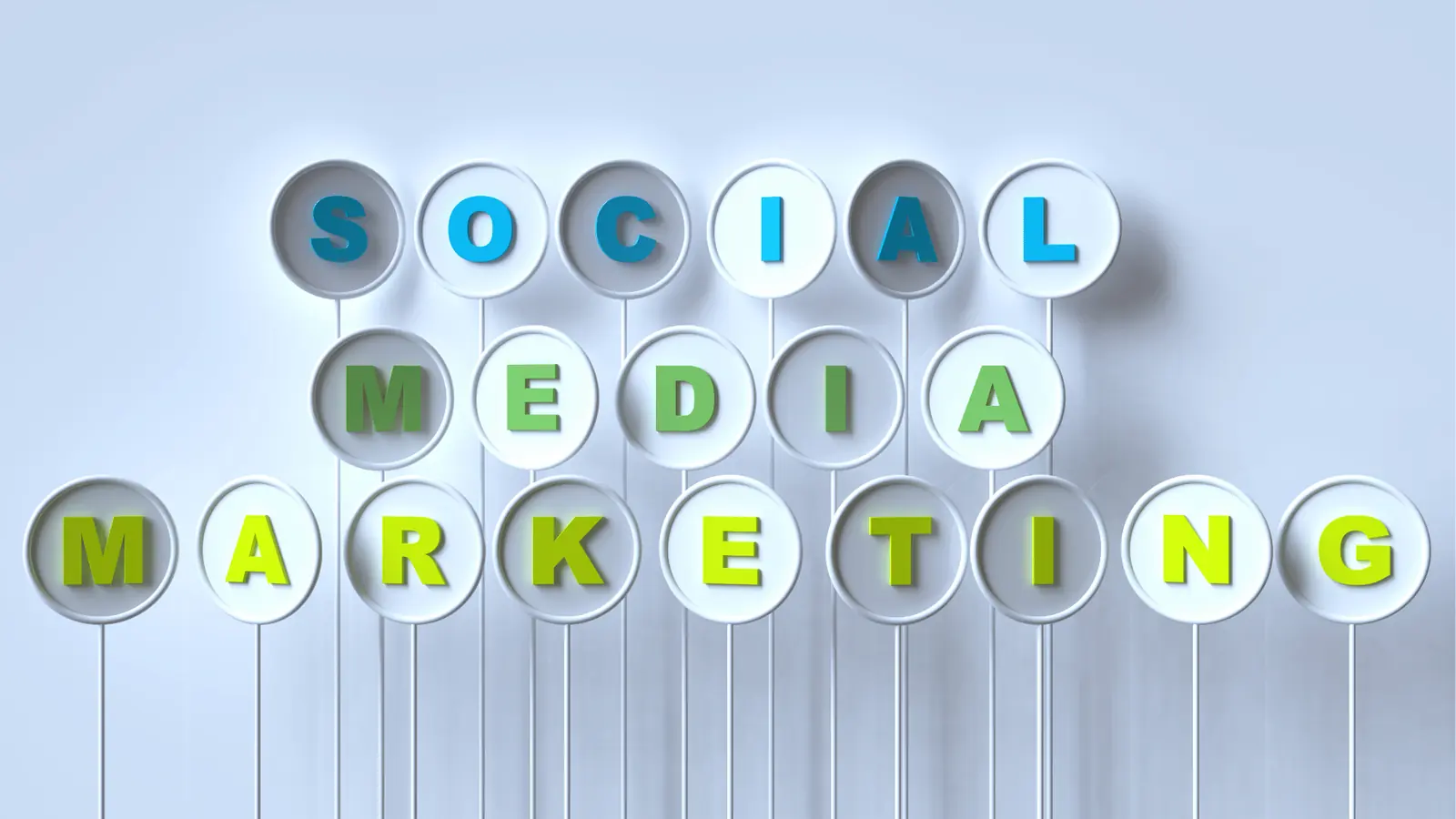 Raised round signs spelling social media marketing in blue and green letters