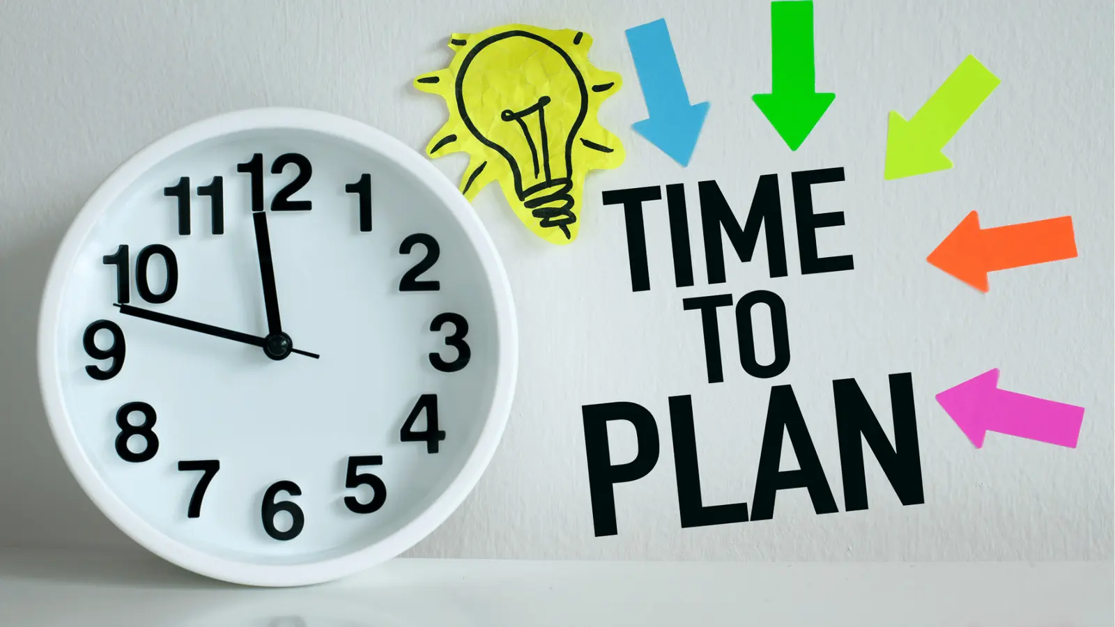 White analog clock beside bold 'TIME TO PLAN' text and colorful arrows for reporting
