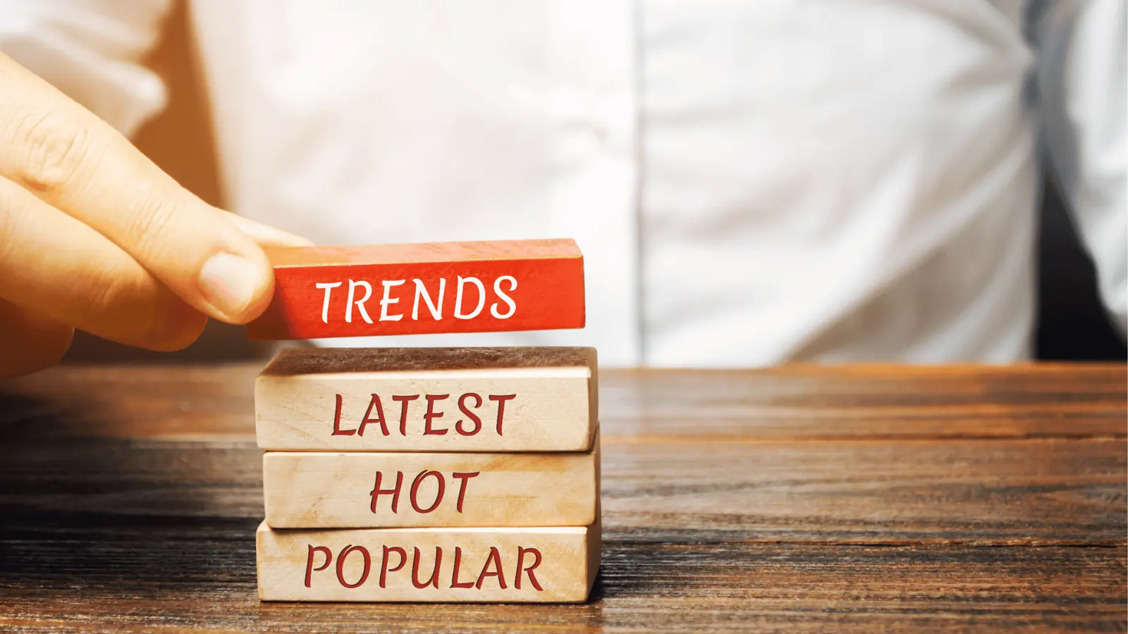 Wooden blocks spelling out trends on a desk